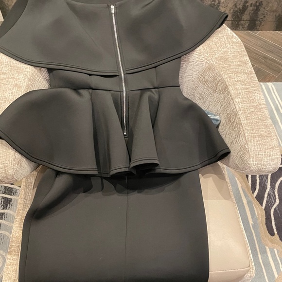 Item#2: Extravagant Black Peplum Dress - Picture 2 of 3